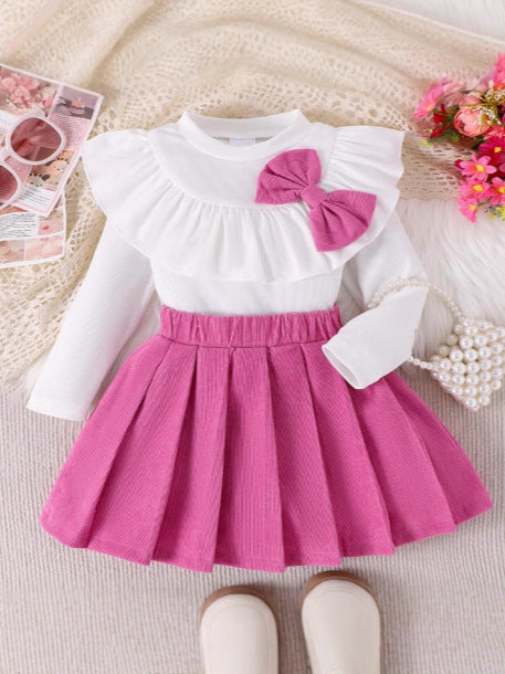 Completo Due Pezzi in Cotone con Dettaglio Bow e Silhouette Skirt-Suit