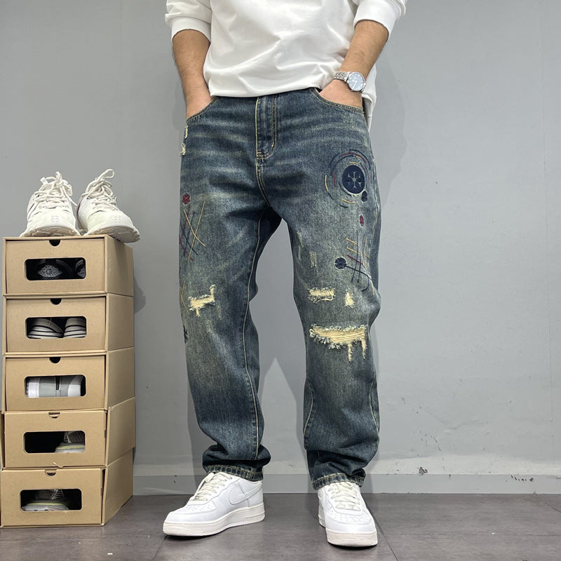 Patch-Embroidered: Vintage Ripped Tapered Denim 2026