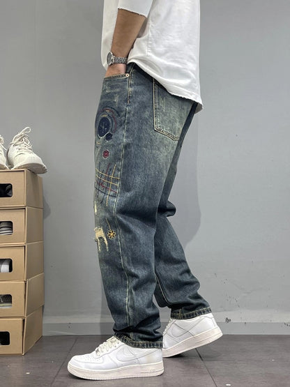 Patch-Embroidered: Vintage Ripped Tapered Denim 2026