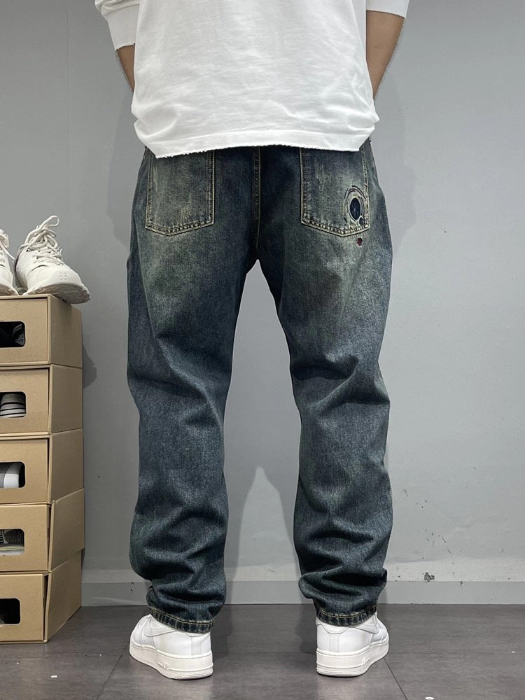 Patch-Embroidered: Vintage Ripped Tapered Denim 2026