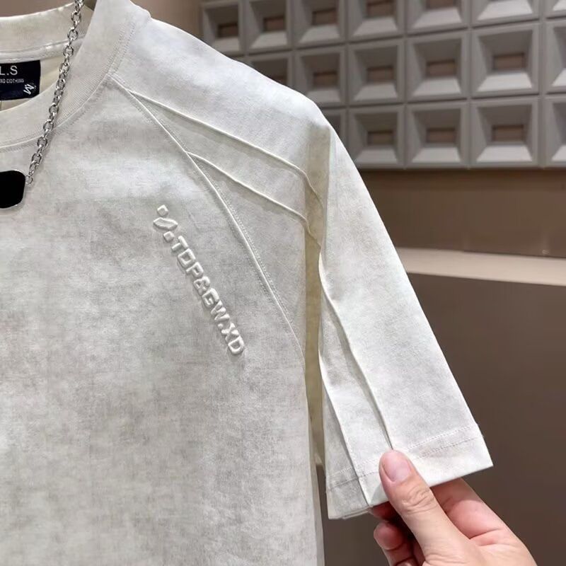 T-Shirt "Deconstructing Letter" Embossed - Primavera/Estate 2026