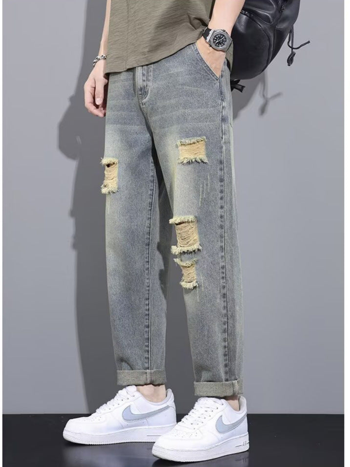 Jeans Distressed con Silhouette Ibrida e Comfort Micro-Bounce