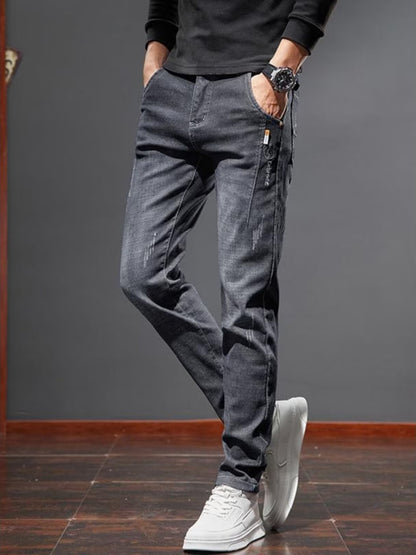 Jeans Slim Fit con Finitura Micro-Bounce e Dettagli Printed
