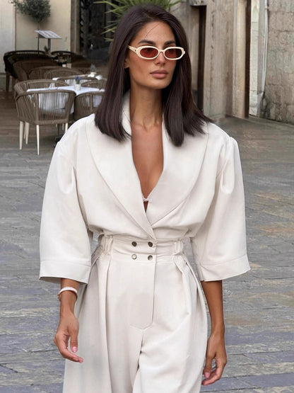 Jumpsuit Sartoriale a Gamba Dritta con Maniche a Sbuffo e Dettagli Button-Down