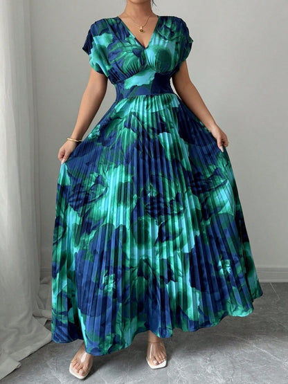 Abito Lungo Plissé con Stampa Floreale "Painted" e Silhouette a Vita Alta