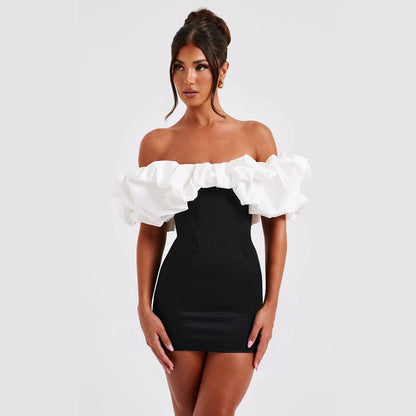 Abito "One-Word Collar" con Maniche a Sbuffo e Silhouette Minimalista