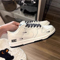 Dunk Low Multi-Swoosh Edition