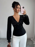 Top Slim con Perle Applicate e Maniche Flared