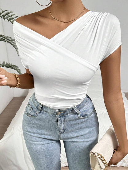 Éclat Plissé: Top Oblique 2026