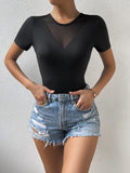 Jumpsuit Slim con Inserti in Pizzo e Mesh Trasparente