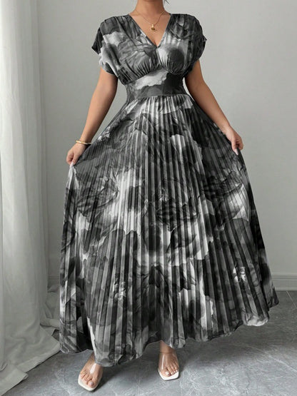 Abito Lungo Plissé con Stampa Floreale "Painted" e Silhouette a Vita Alta